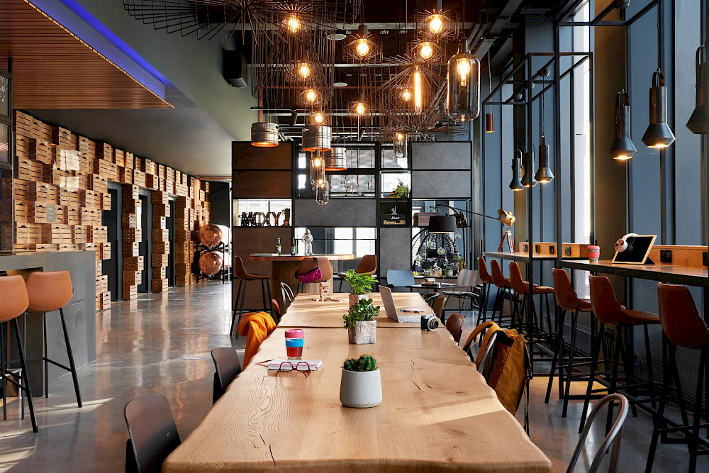 Communal work table at Moxy Edinburgh Fountainbridge